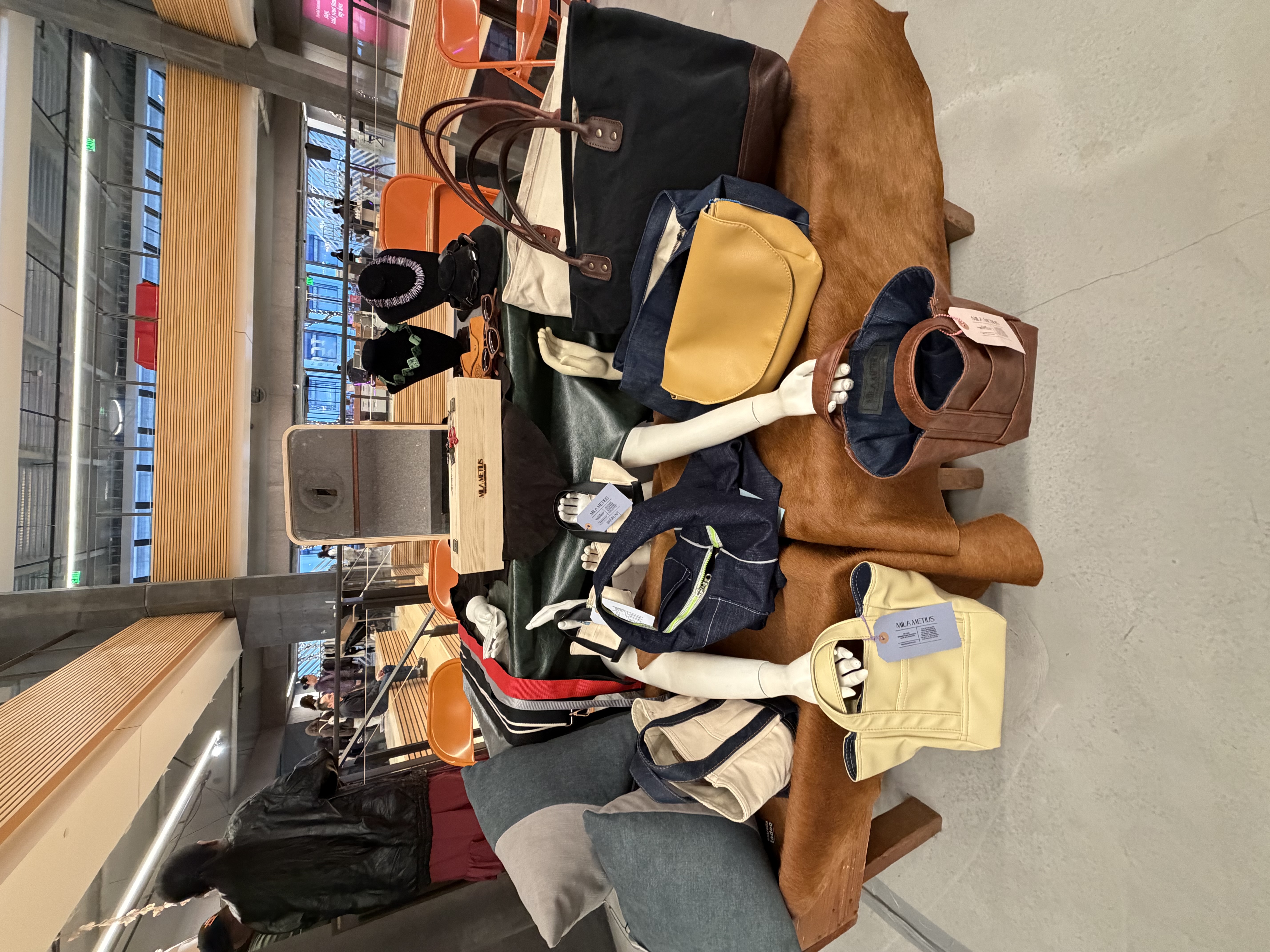 Mila Metius bag display with holiday decor