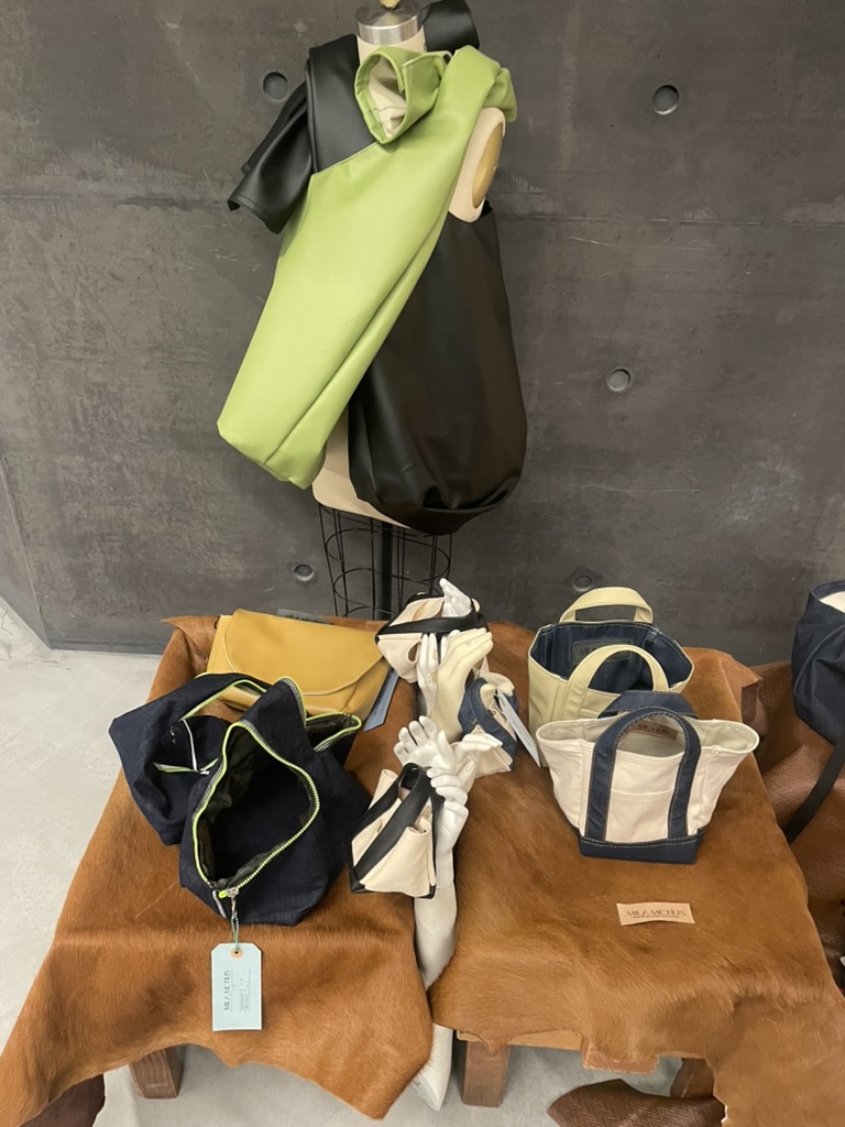 Mila Metius bag display close-up with holiday decor