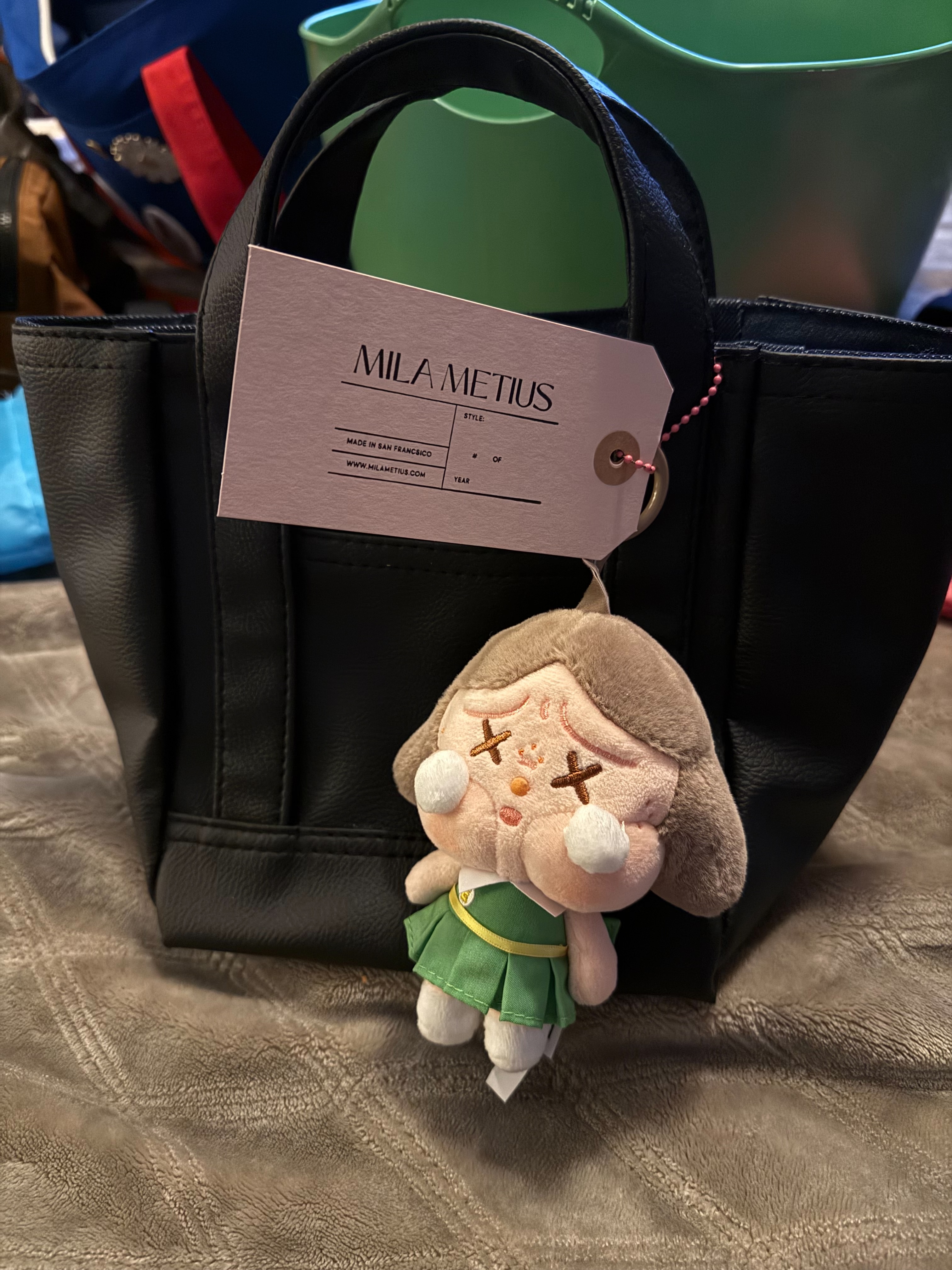 Black Mila Metius bag in a holiday setting